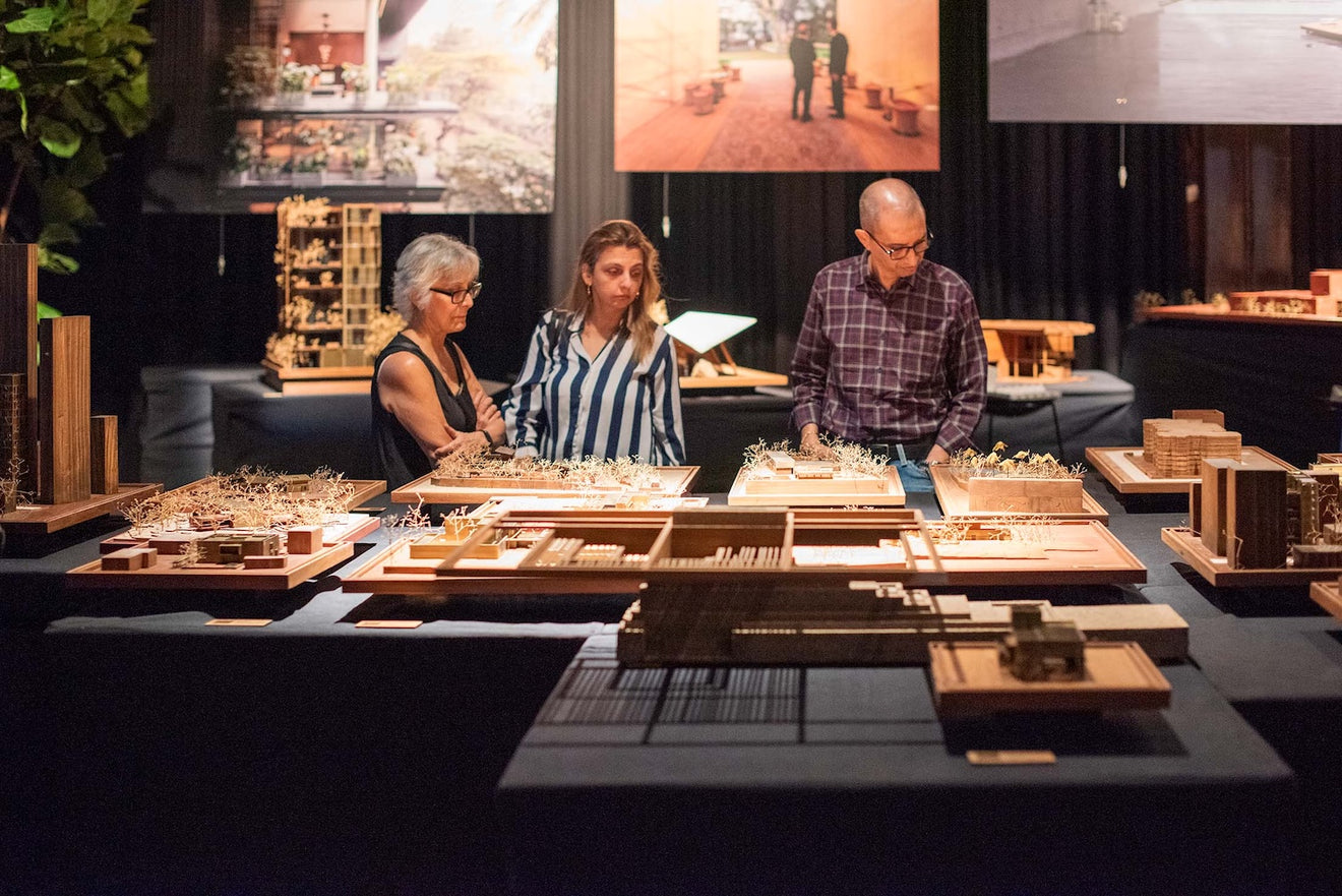 Attendees interacting with the ‘wordless exhibit’