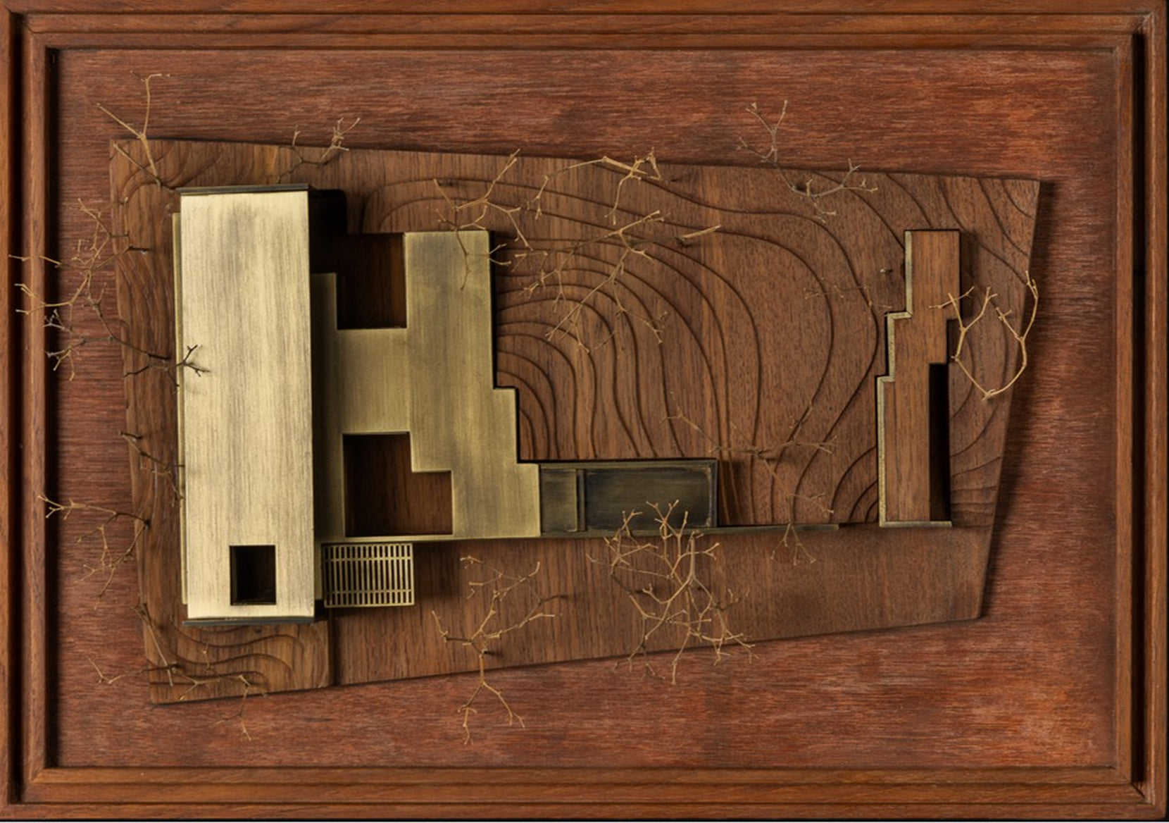 Study model from directly above, linear blocks laid across carved ground contours
