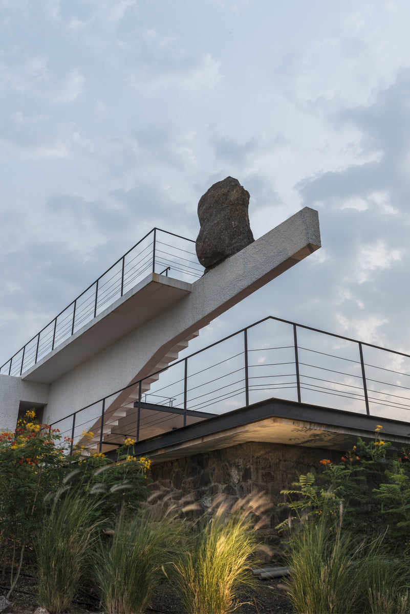 House with the Soaring Rock, the boulder poised on the tip of the concrete cantilever