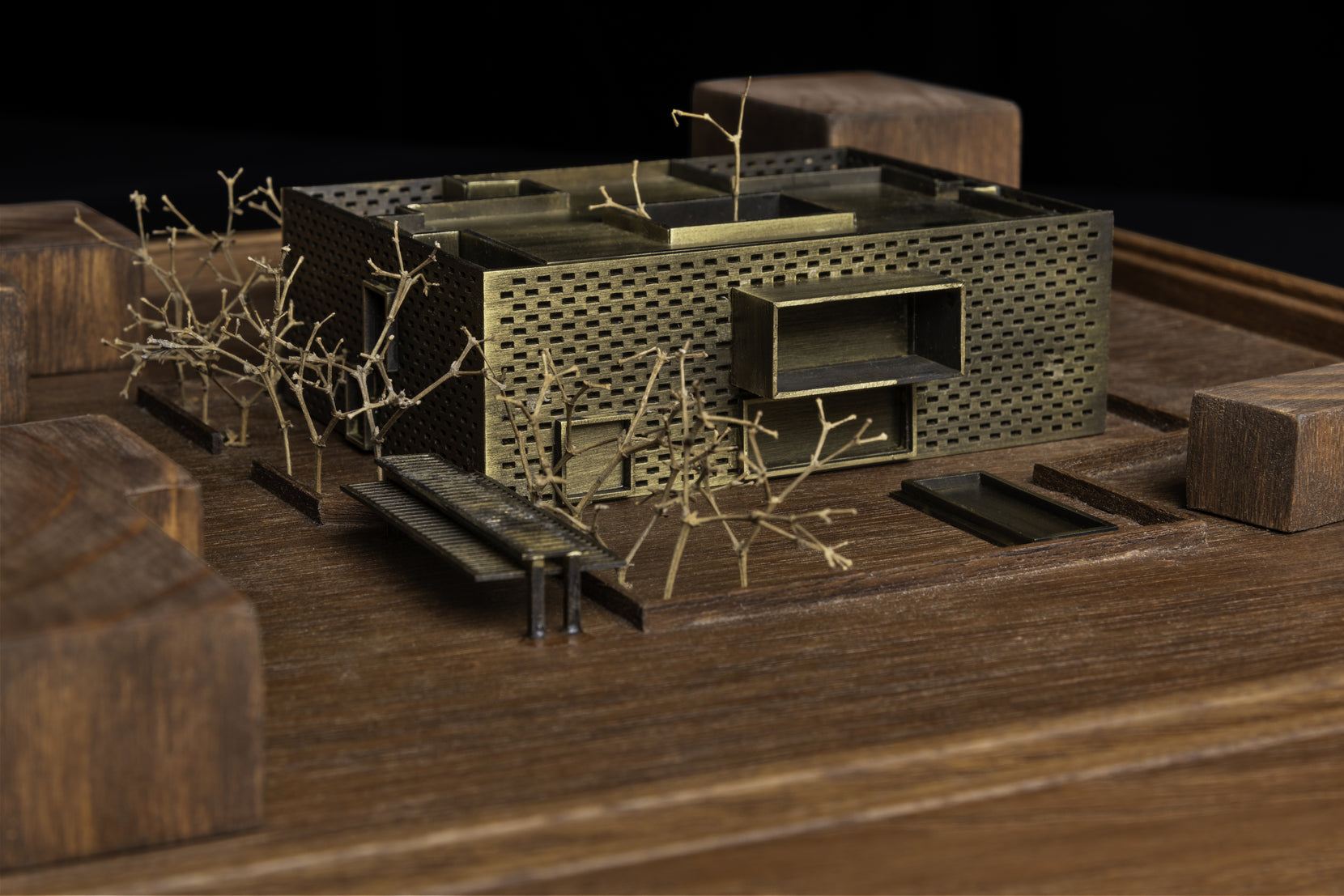 Scale model of Ishtika in brass, the perforated box opened at the courtyard, seen obliquely