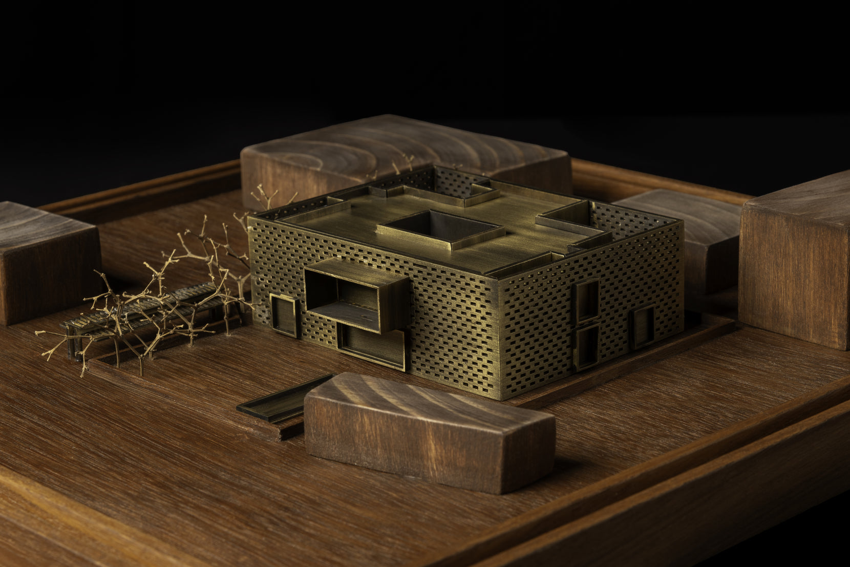 Study model from above, showing the open courtyard cut into the perforated brick block