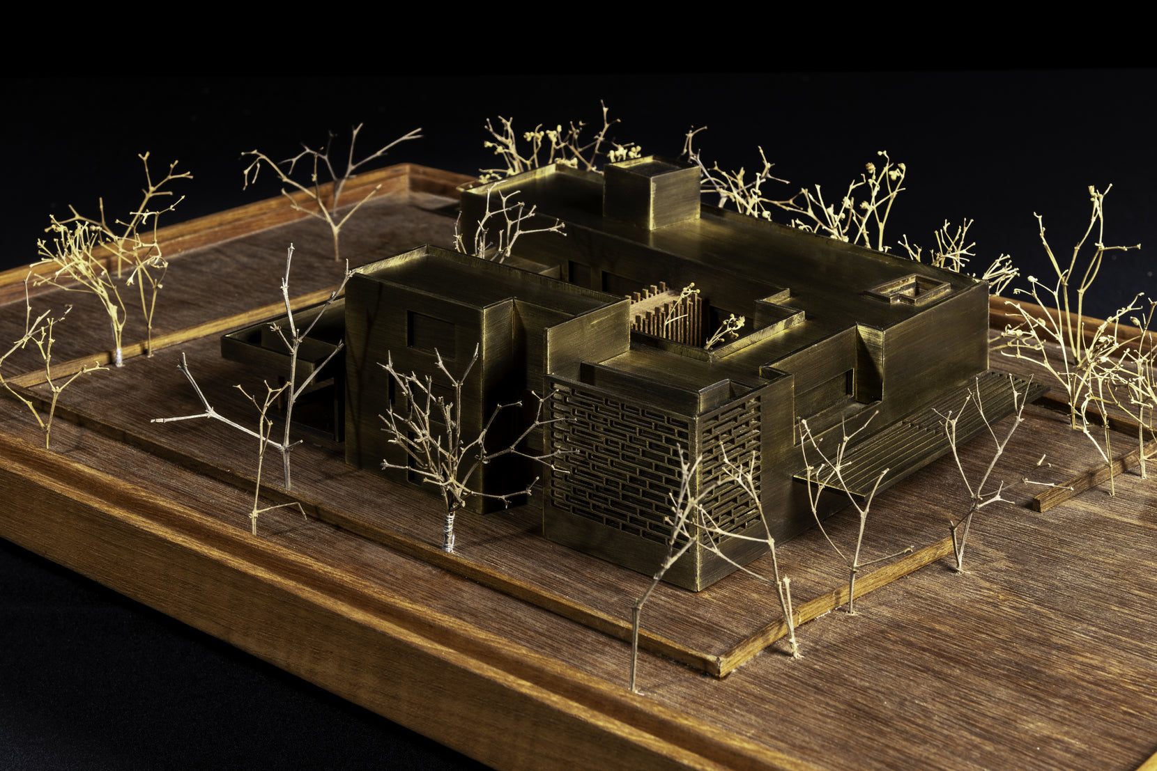 Scale model of Ishtika in brass, courtyards and wire trees seen from above