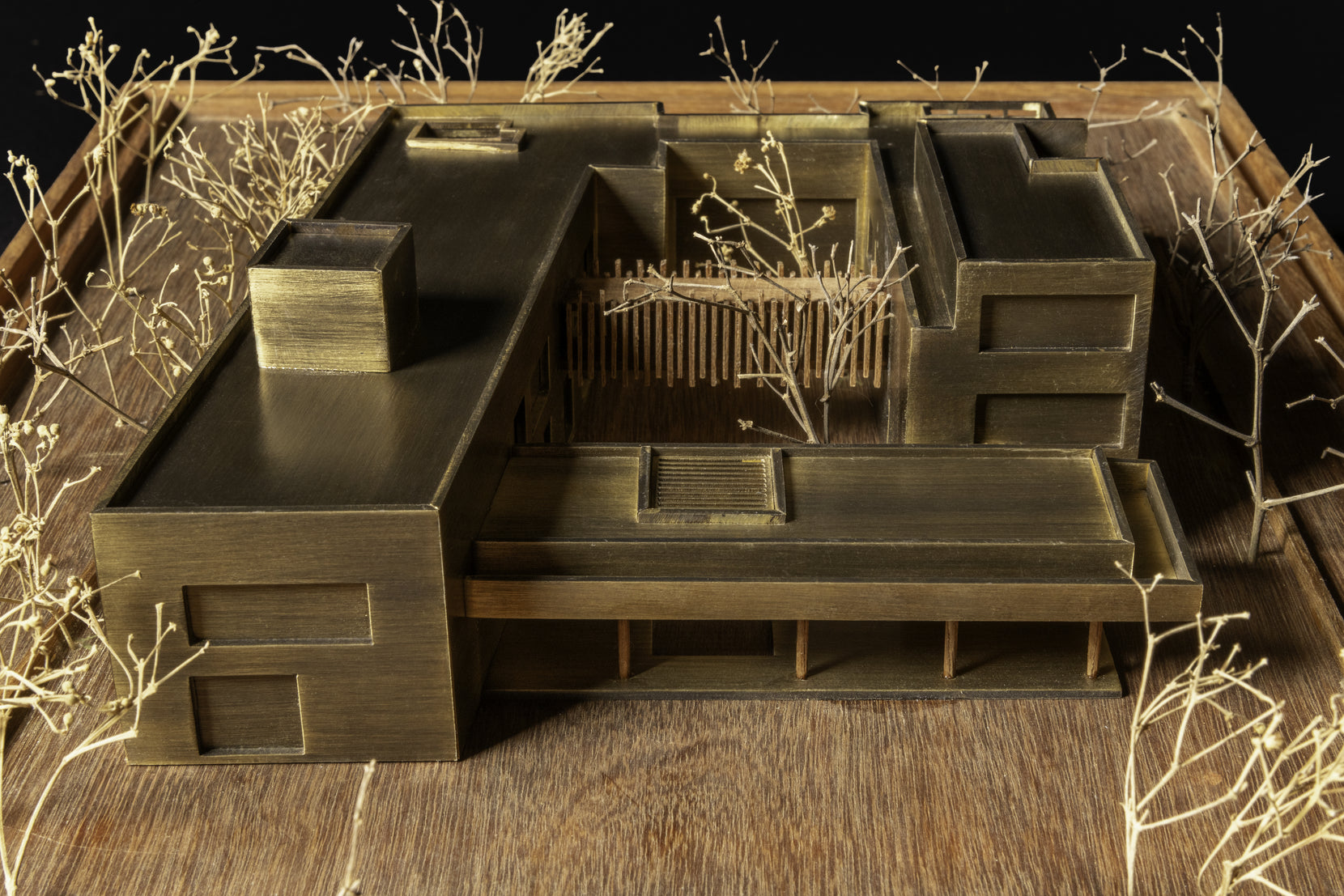 Physical study model at eye level, showing the massing around the central courtyard