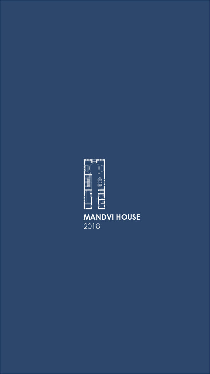 White-on-blue floor plan captioned Mandvi House 2018, showing the narrow deep plot