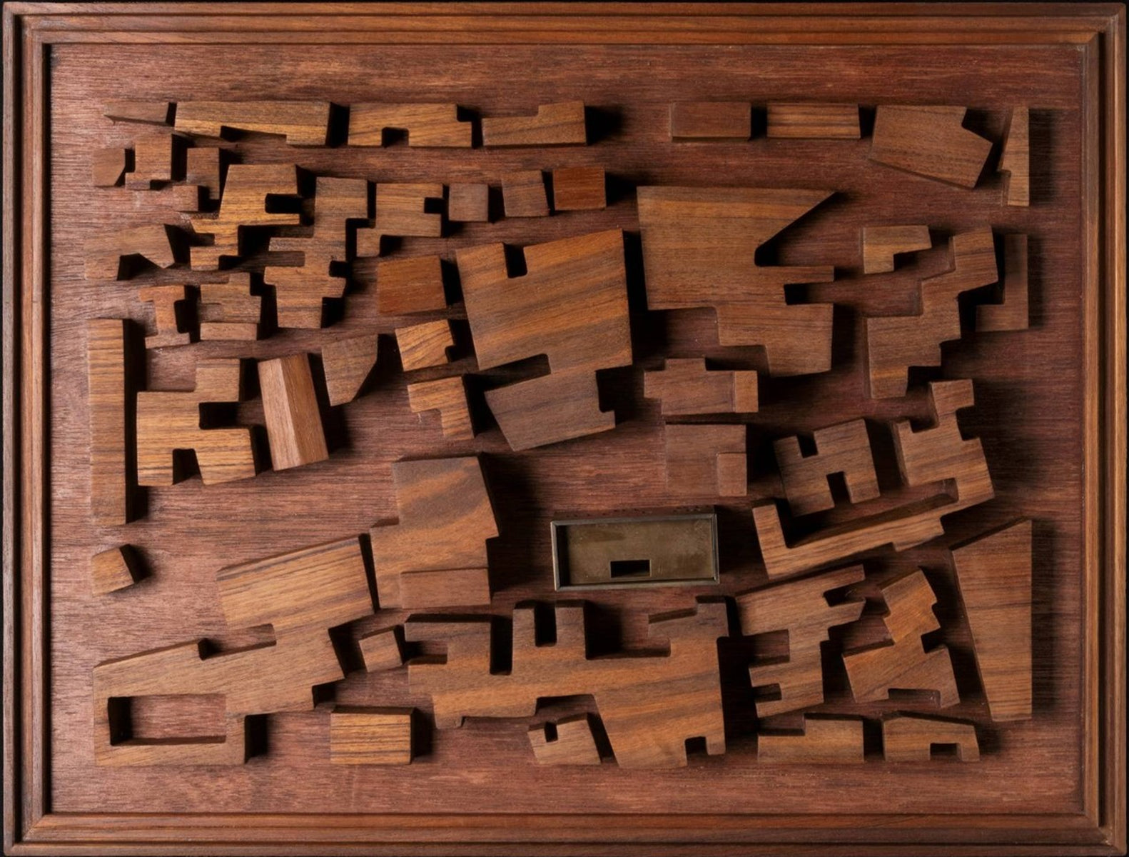 Timber context study model of the neighbourhood from above, the house picked out in brass