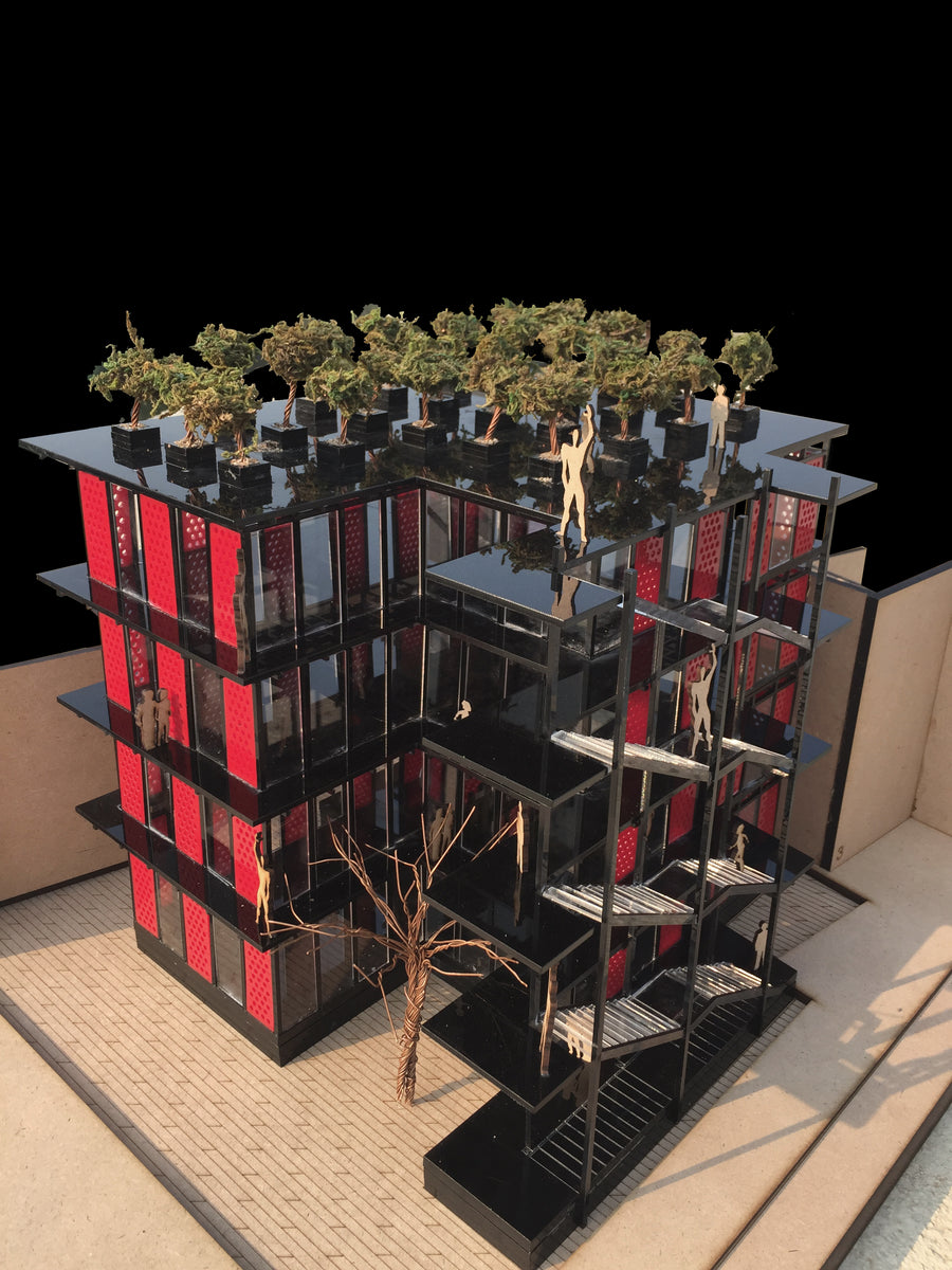 Physical model with red perforated panels and model trees planted on the roof deck